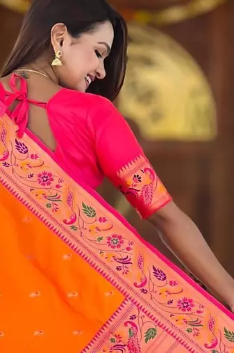 Orange elegant art silk woven saree with rich zari border