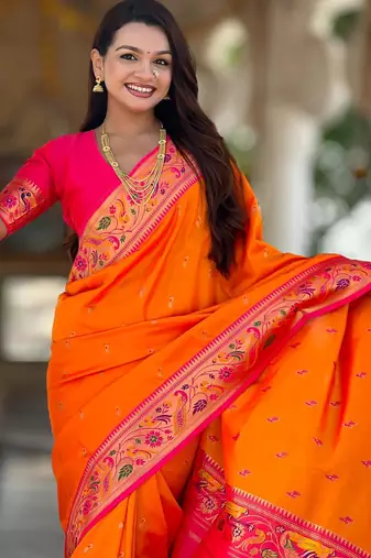 Orange elegant art silk woven saree with rich zari border