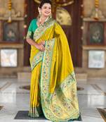Green elegant art silk woven saree with rich zari border