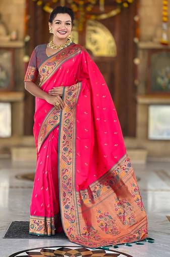 Pink elegant art silk woven saree with rich zari border