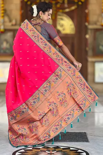 Pink elegant art silk woven saree with rich zari border