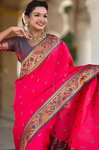 Pink elegant art silk woven saree with rich zari border