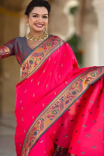 Pink elegant art silk woven saree with rich zari border