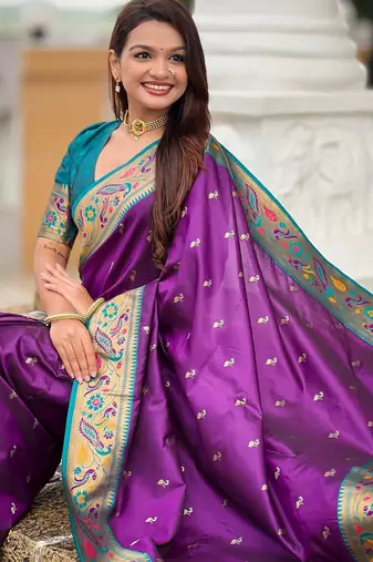 Violet elegant art silk woven saree with rich zari border