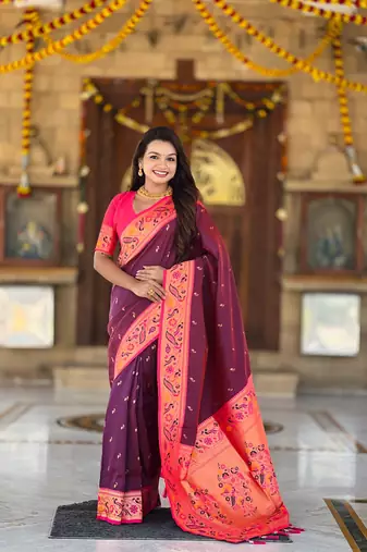 Wine elegant art silk woven saree with rich zari border