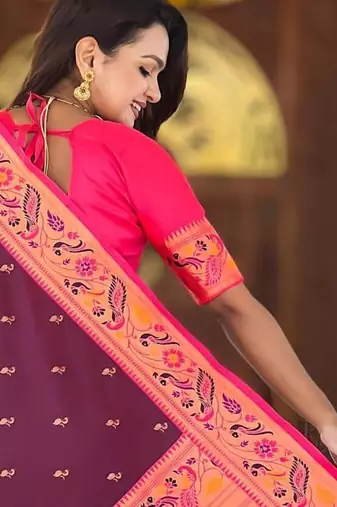 Wine elegant art silk woven saree with rich zari border