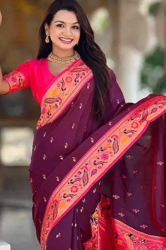 Wine elegant art silk woven saree with rich zari border