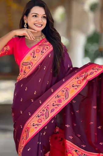 Wine elegant art silk woven saree with rich zari border
