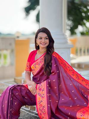 Wine elegant art silk woven saree with rich zari border 5