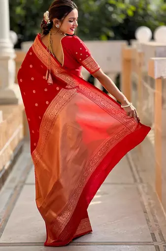 Red elegant art silk woven saree with rich zari border
