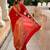 Red elegant art silk woven saree with rich zari border