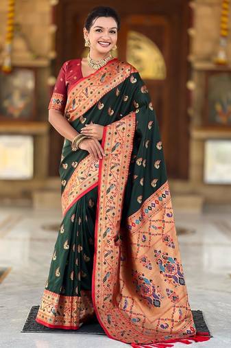 Green elegant art silk woven saree with rich zari border