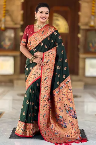 Green elegant art silk woven saree with rich zari border