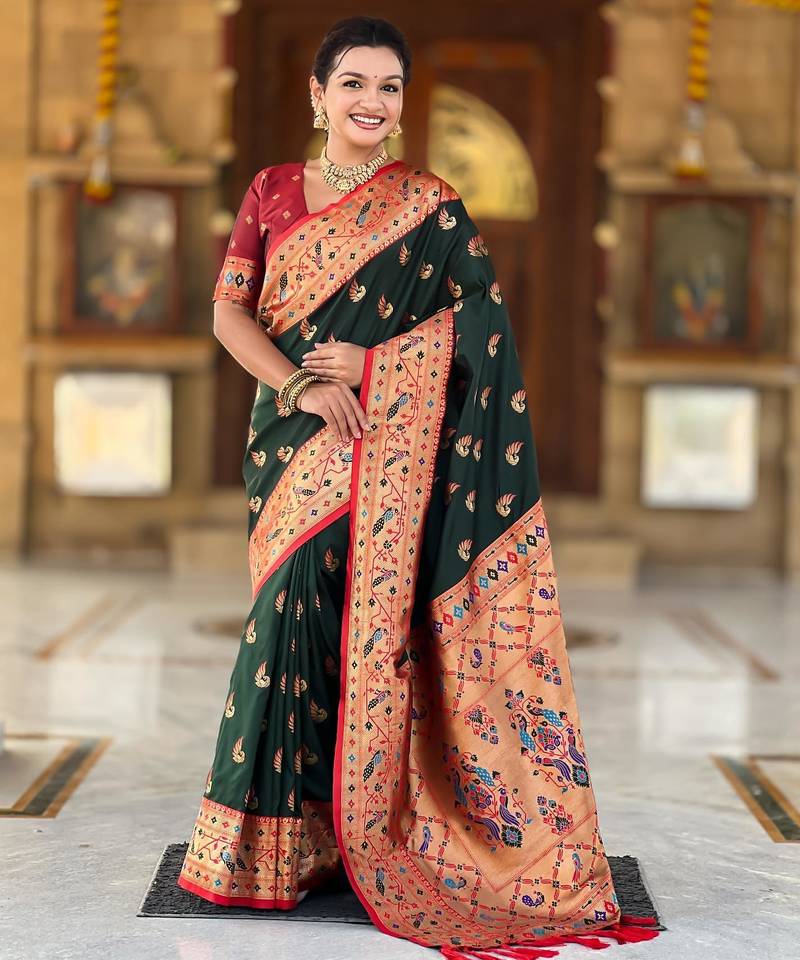 Green elegant art silk woven saree with rich zari border