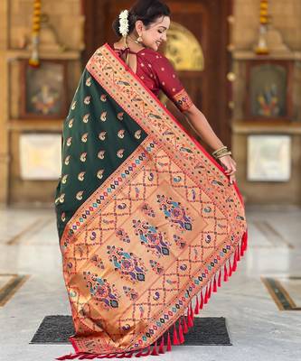 Green elegant art silk woven saree with rich zari border 2
