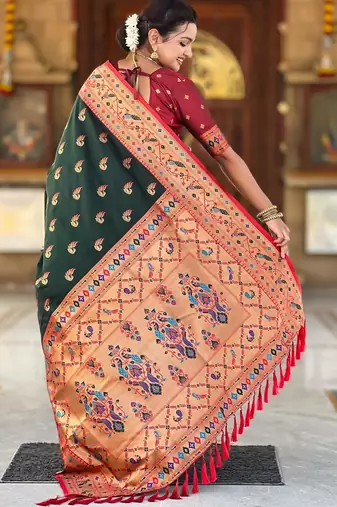 Green elegant art silk woven saree with rich zari border