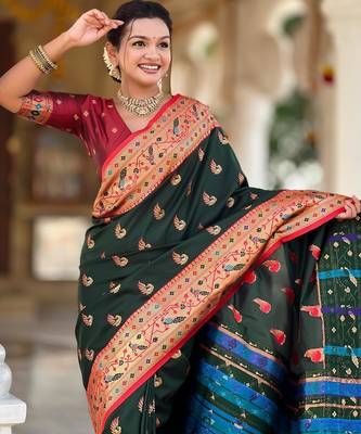 Green elegant art silk woven saree with rich zari border 3