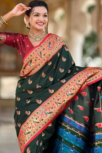 Green elegant art silk woven saree with rich zari border