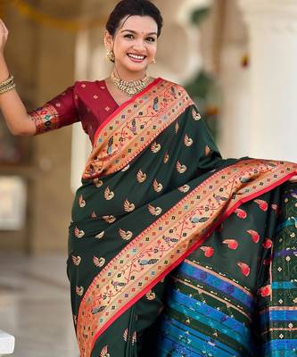 Green elegant art silk woven saree with rich zari border 4