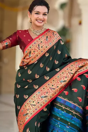 Green elegant art silk woven saree with rich zari border
