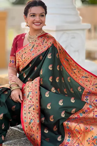 Green elegant art silk woven saree with rich zari border