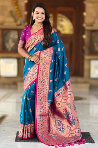 Turquoise elegant art silk woven saree with rich zari border