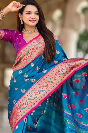 Turquoise elegant art silk woven saree with rich zari border