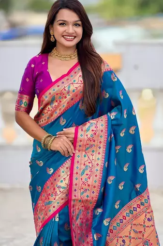 Turquoise elegant art silk woven saree with rich zari border