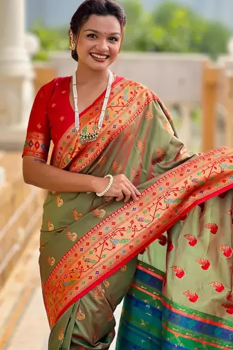 Mehendi elegant art silk woven saree with rich zari border
