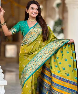 Green elegant art silk woven saree with rich zari border 3