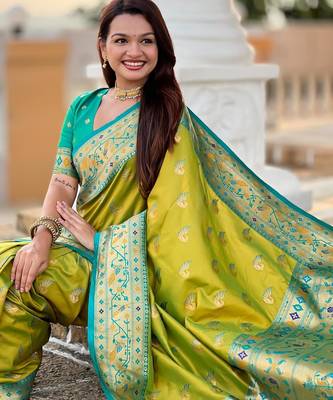 Green elegant art silk woven saree with rich zari border 5