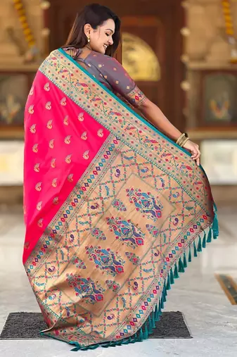 Pink elegant art silk woven saree with rich zari border