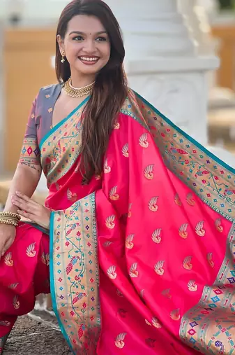 Pink elegant art silk woven saree with rich zari border
