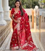 Red elegant art silk woven saree with rich zari border