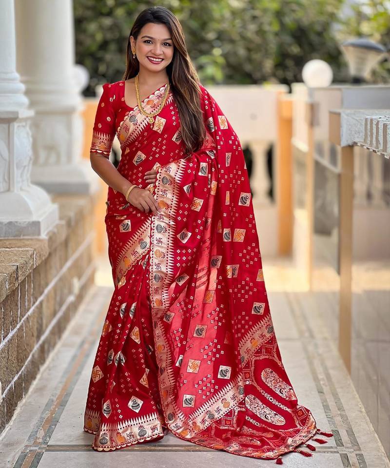 Red elegant art silk woven saree with rich zari border