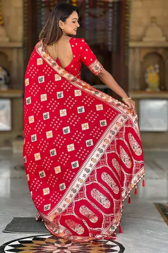 Red elegant art silk woven saree with rich zari border