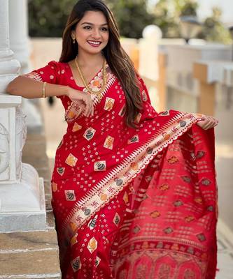 Red elegant art silk woven saree with rich zari border 4