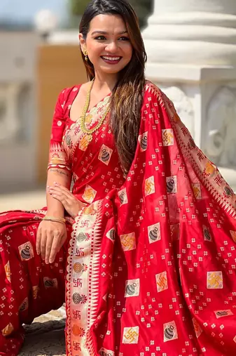 Red elegant art silk woven saree with rich zari border