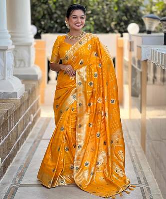 Yellow elegant art silk woven saree with rich zari border 1