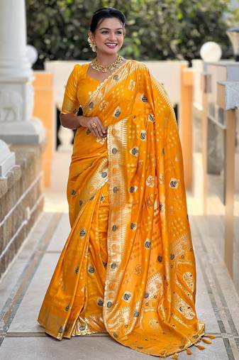 Yellow elegant art silk woven saree with rich zari border