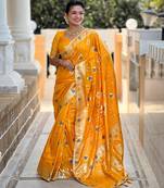 Yellow elegant art silk woven saree with rich zari border