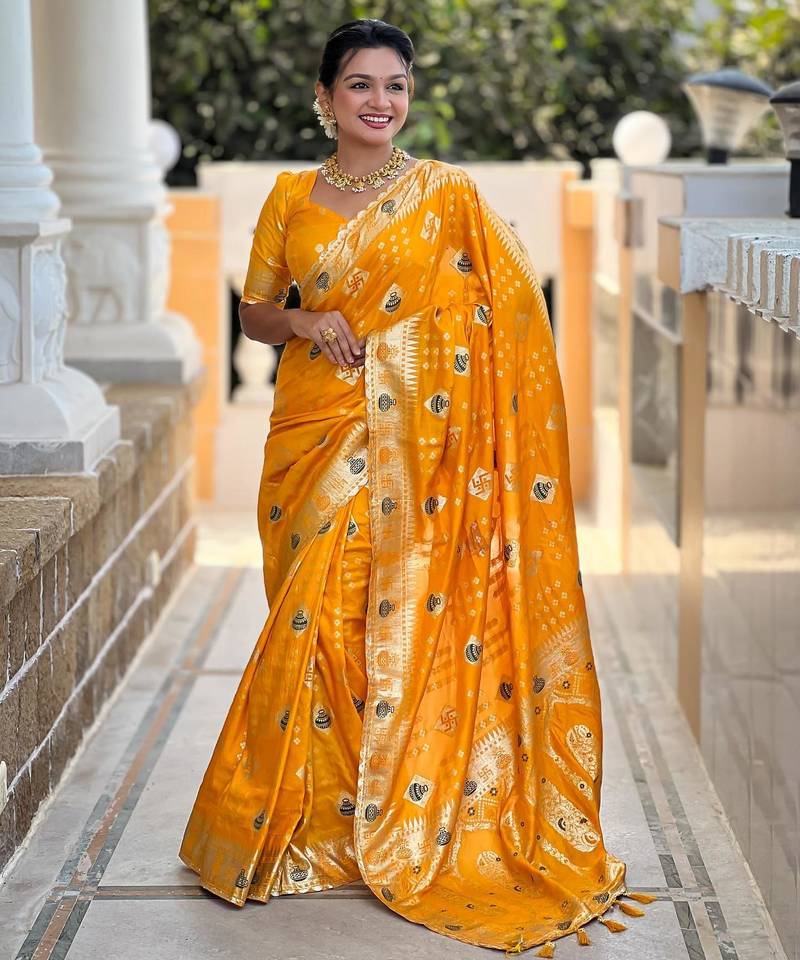 Yellow elegant art silk woven saree with rich zari border