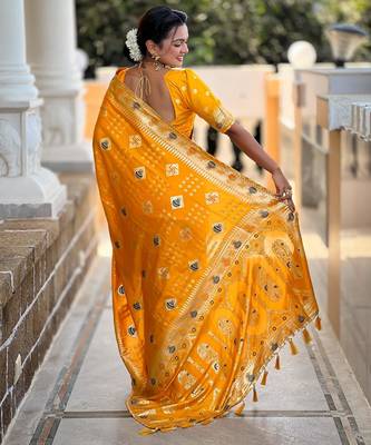 Yellow elegant art silk woven saree with rich zari border 2