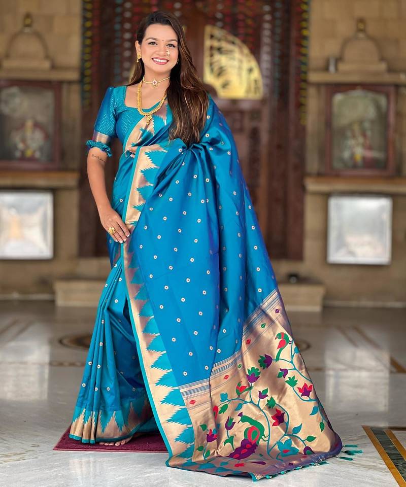 Turquoise elegant art silk woven saree with rich zari border