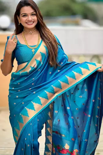 Turquoise elegant art silk woven saree with rich zari border