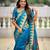 Turquoise elegant art silk woven saree with rich zari border