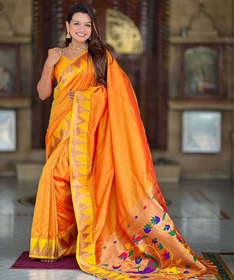 Orange elegant art silk woven saree with rich zari border