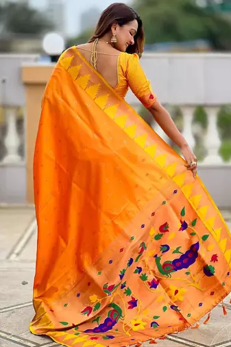 Orange elegant art silk woven saree with rich zari border