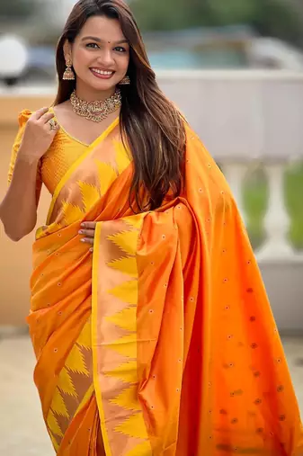 Orange elegant art silk woven saree with rich zari border