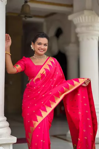 Pink elegant art silk woven saree with rich zari border